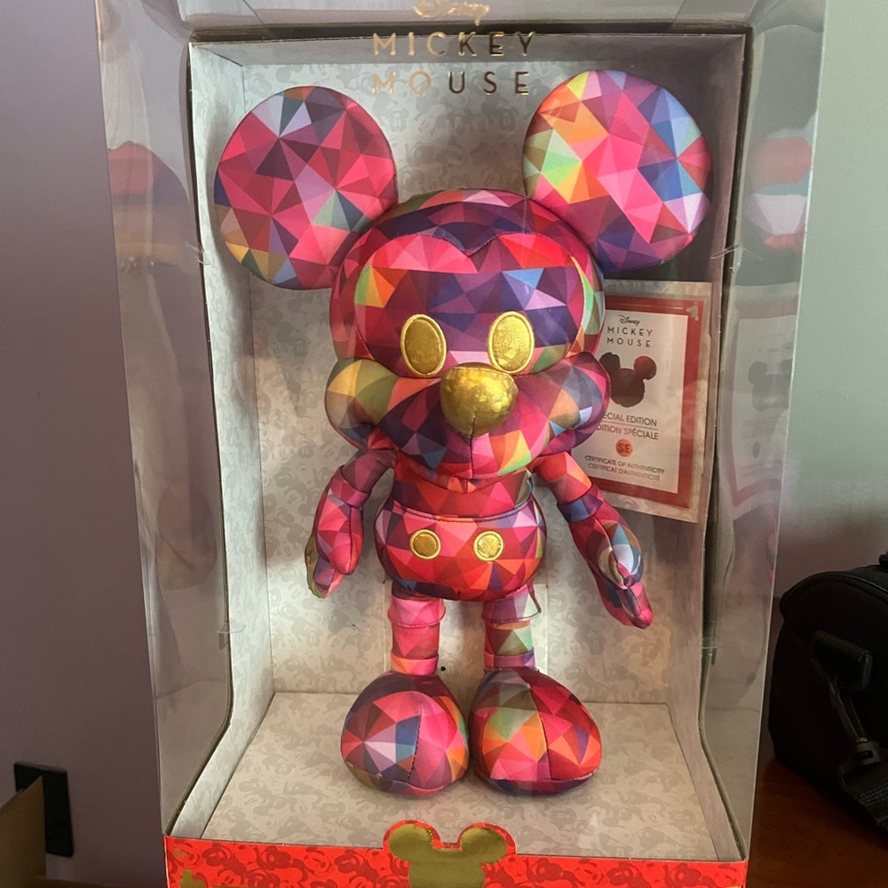 Limited edition kaleidoscope Mickey Mouse plush.